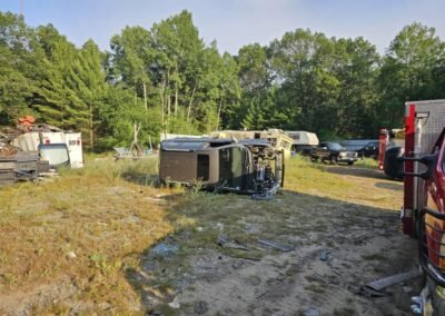 A vehicle on its side staged for extrication training