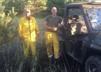 Fred R. LaPoint and Scott MacNeill stand beside the department’s UTV