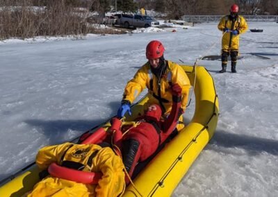 Rescuers bring a person to safety in the inflatable rescue boat