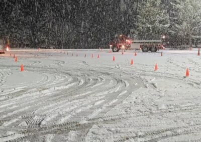 Cone course laid out in the snow on the Little River Casino Resort parking lot for night driver training, December 2, 2024