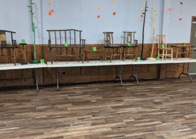Auction items lined up along the wall