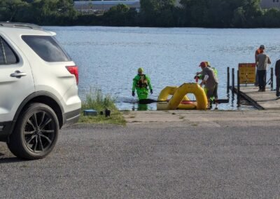 Members launch the inflatable rescue craft from a boat ramp