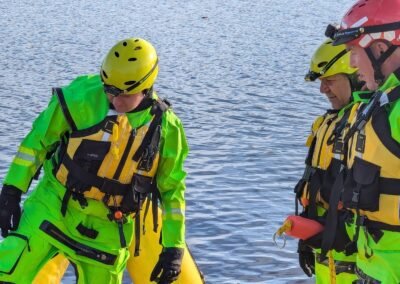 A member climbs into the rescue craft