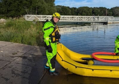 A member stands beside the rescue craft at the ramp